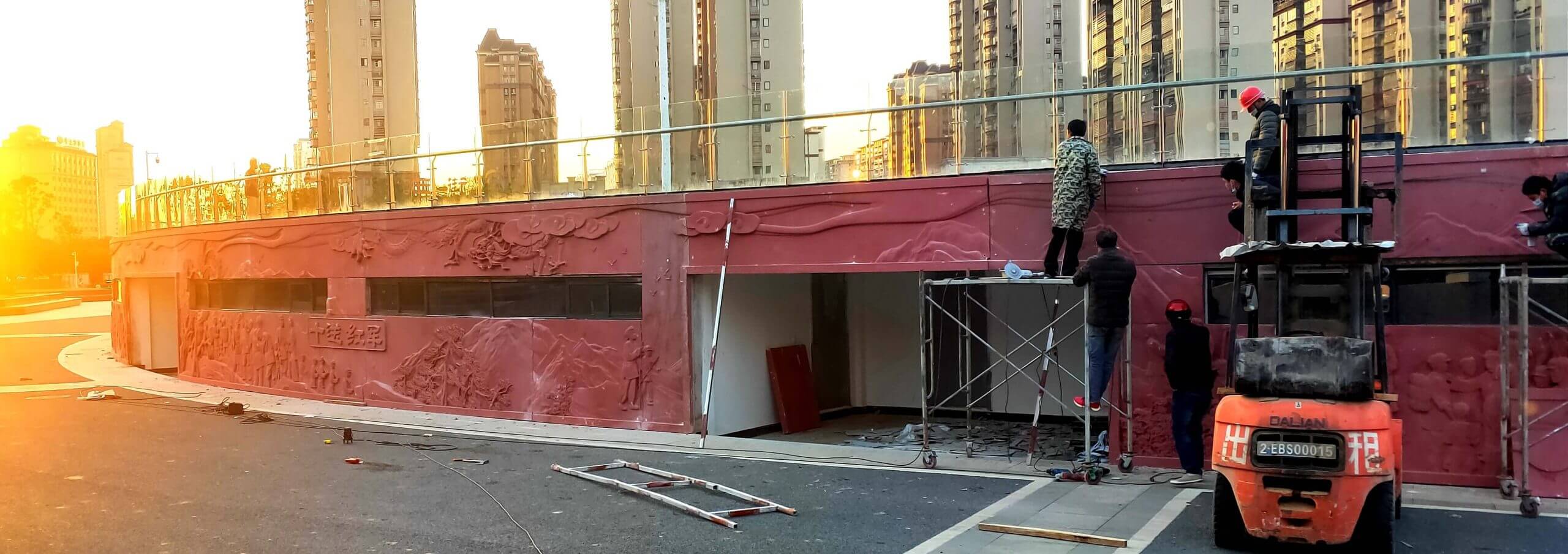 Decorative pendant featuring landscape and figures